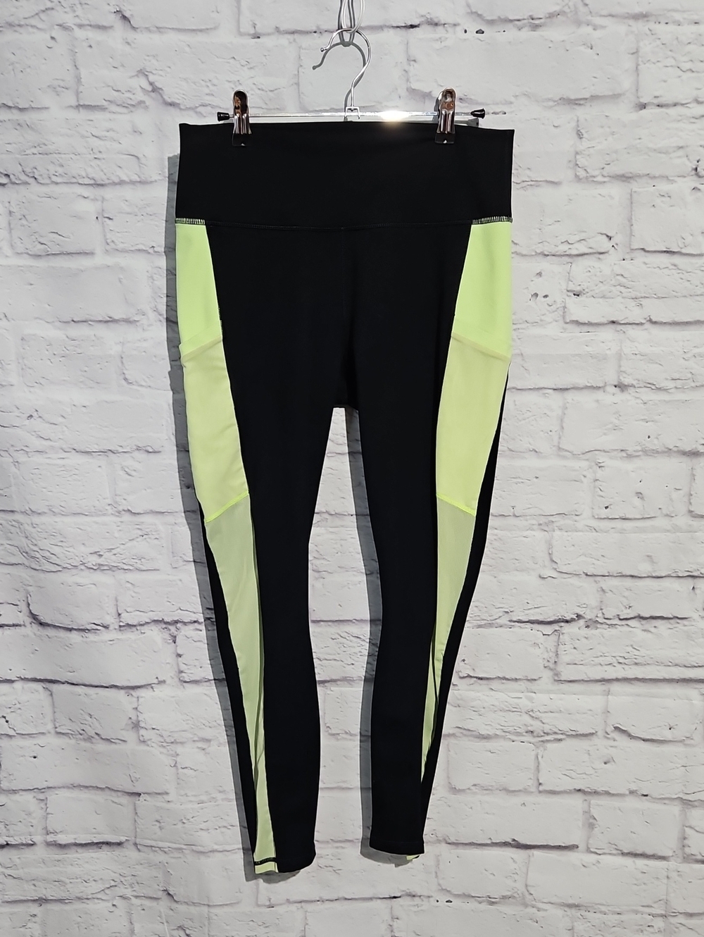 Fabletics Black Leggings with Neon Yellow Mesh Side Panels